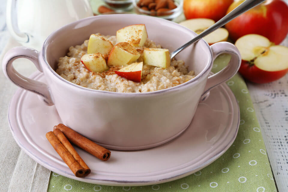 Apple pie oatmeal with cinnamon on a green napkin