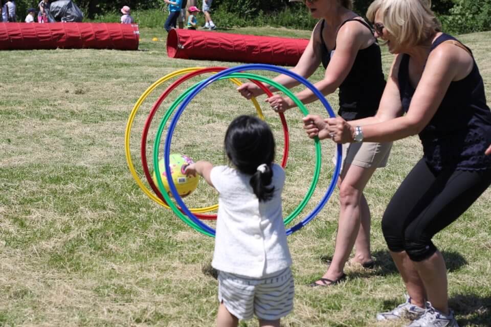 playing with hoola hoops