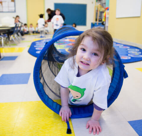 Child playing indoors at daycare