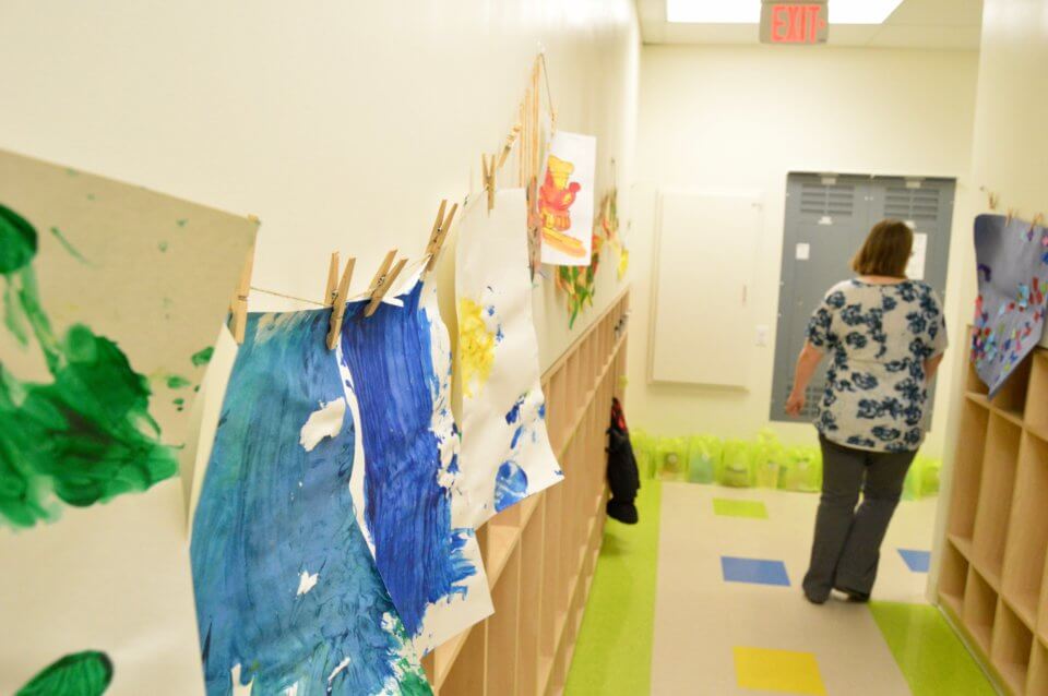 Hallway with paintings at Red Deer Daycare