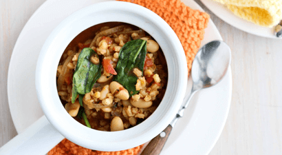 Barley strew on a white plate with spoon