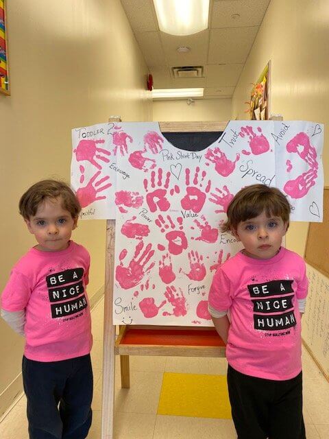 children celebrating pink shirt day