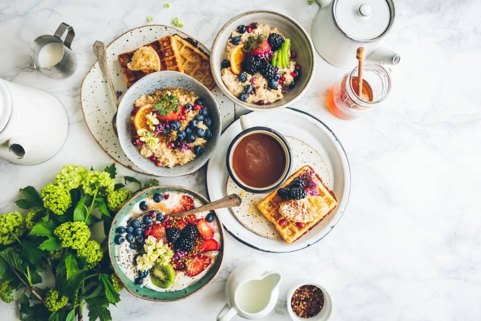 Sunday brunch with waffles, oats and fruit