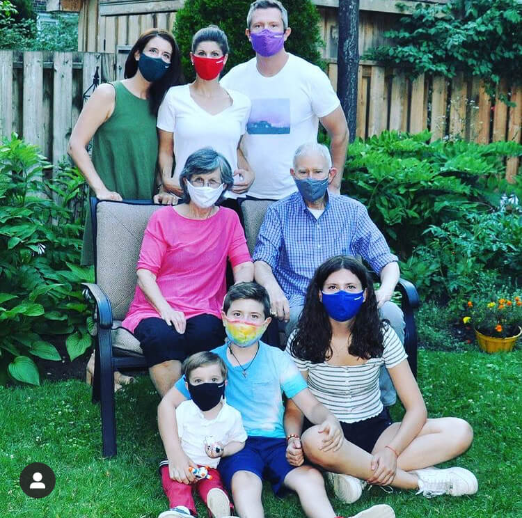 Family during covid-19 wearing masks