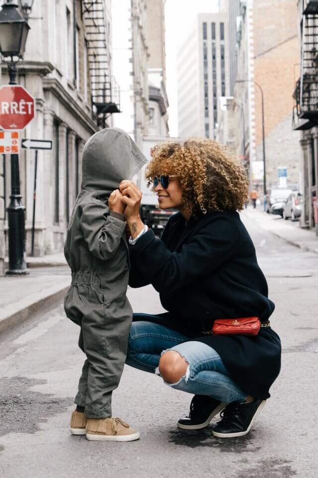 Mother and son together on the street