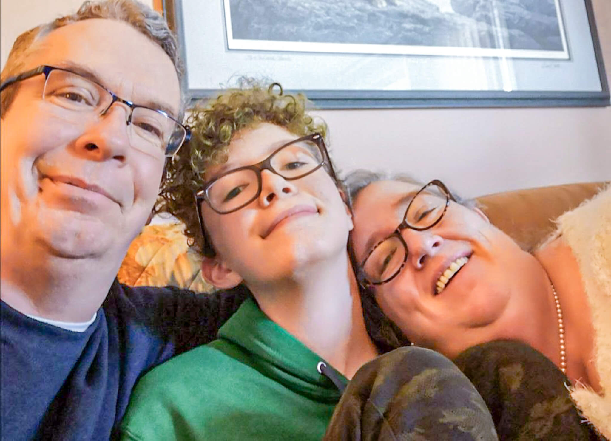 Family of three sitting together