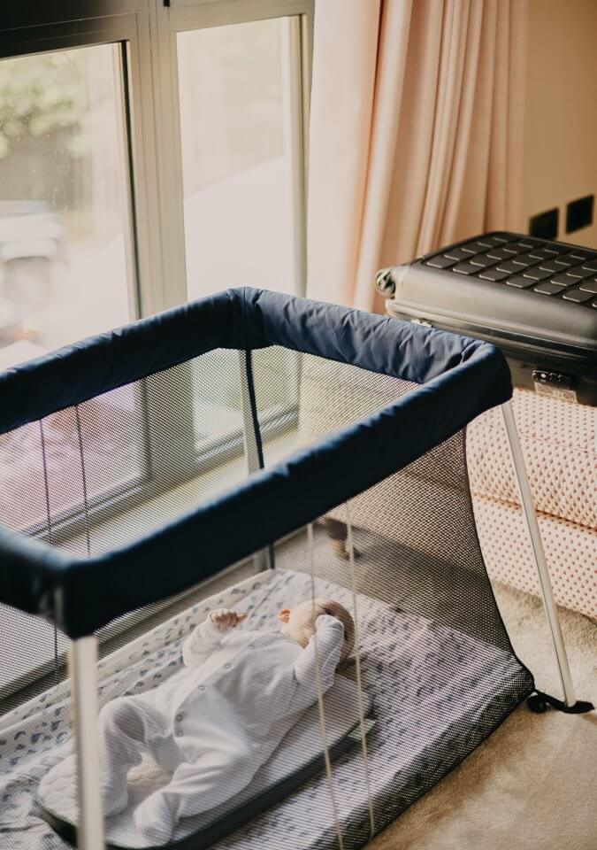 Child napping in a crib