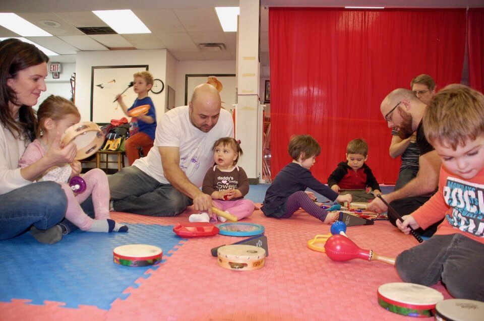 Children playing music as a group