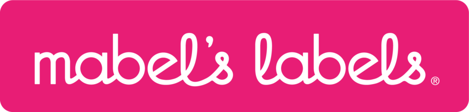 Bright pink rectangular logo with rounded corners, displaying the white text "mabel's labels" in a playful, stylized font.