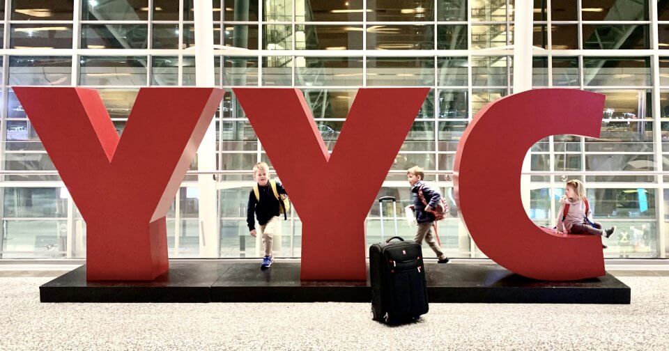 Three children at the Calgary airport